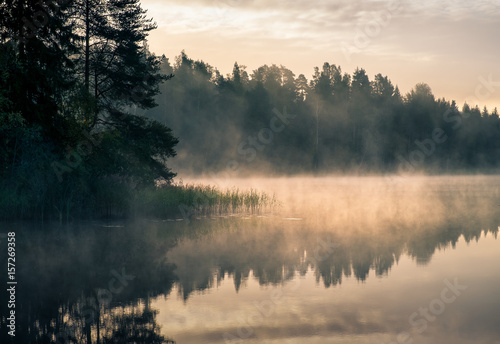 Scenic landscape with lake and sunrise at morning in Finland © Jani Riekkinen