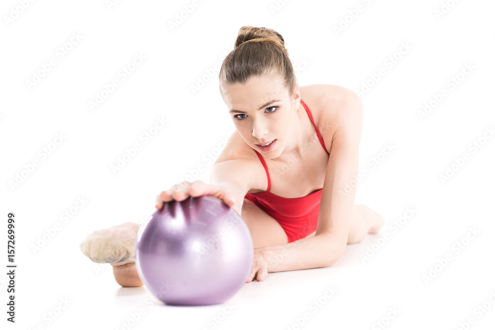 fit rhythmic gymnast exercising with ball isolated on white fit rhythmic gymnast exercising with ball isolated on white
