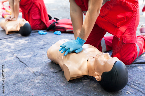 CPR. First aid training concept. Cardiac massage. photo