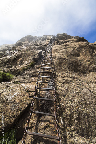 Dangerous chain ladders on the Sentinel Hike, Drakensberge, South Africa photo
