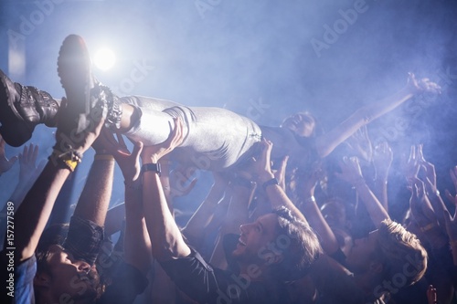 Photography Crowd surfing at a concert