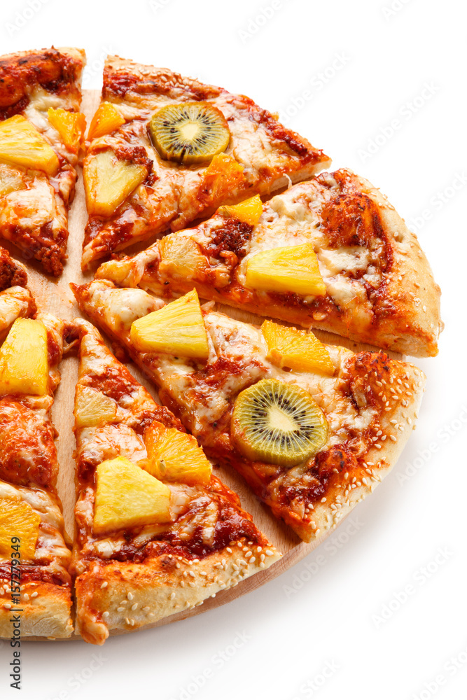Pineapple and kiwi pizza on white background Pineapple and kiwi pizza on white background