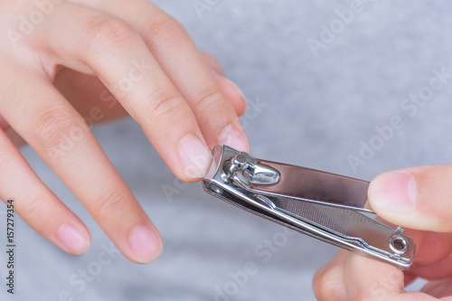 Long finger nails and dirty. It's time to cut with a nail clipper.