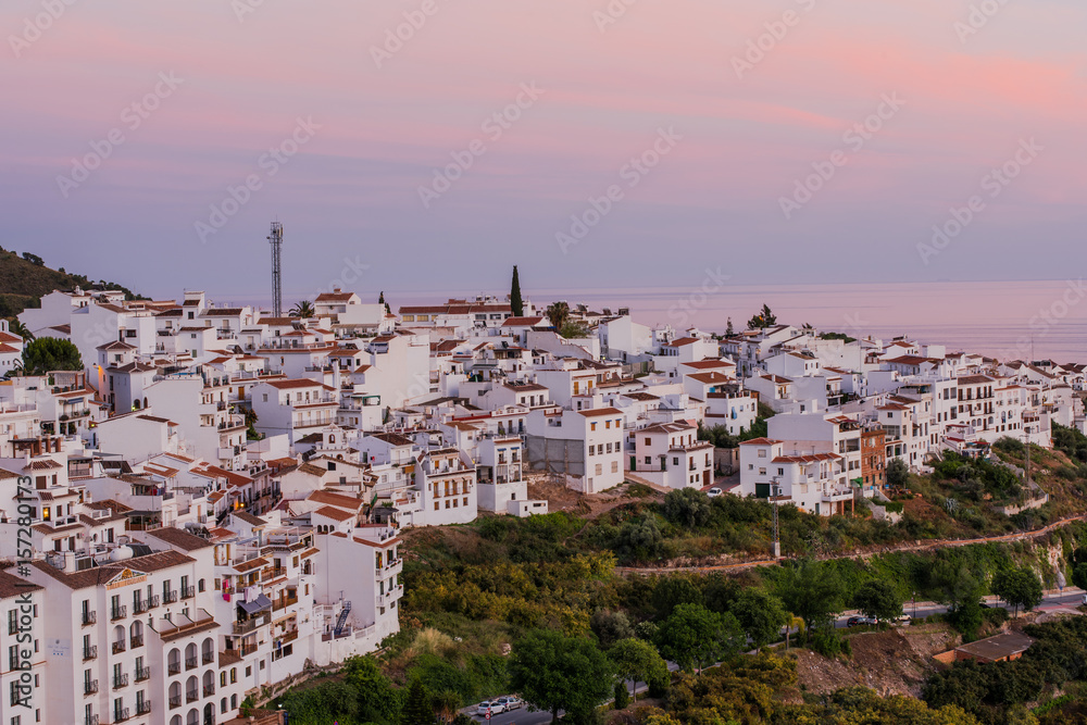 Φωτογραφία Cityscape of Frigiliana white villafe at sunset