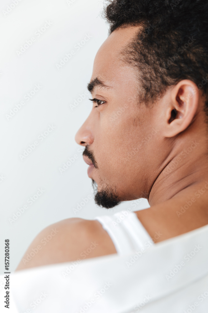 Fototapeta premium Serious young african man isolated