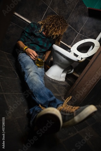 Man sleeping in the washroom