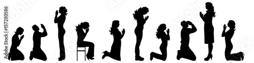Vector silhouette of people who pray on white background.
