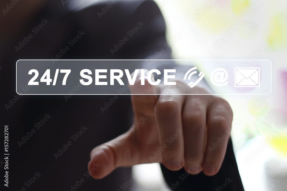 Businessman pressing button 24 hours service modern technology panel Businessman pressing button 24 hours service modern technology panel