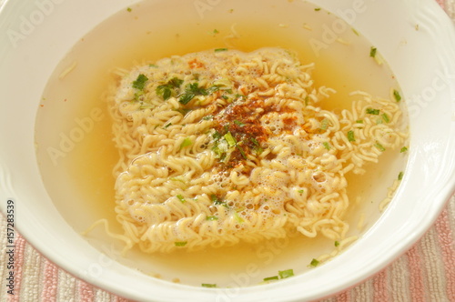 soft boiled instant noodles dressing seasoning on bowl