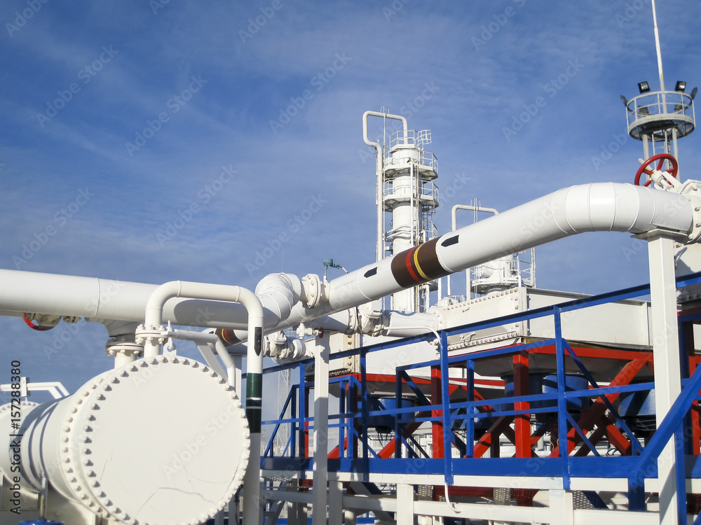 Heat exchangers in a refinery. Heated gasoline air cooler. The equipment for oil refining Heat exchangers in a refinery. Heated gasoline air cooler. The equipment for oil refining