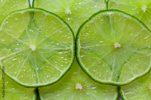 Sliced limes green fruits backround texture