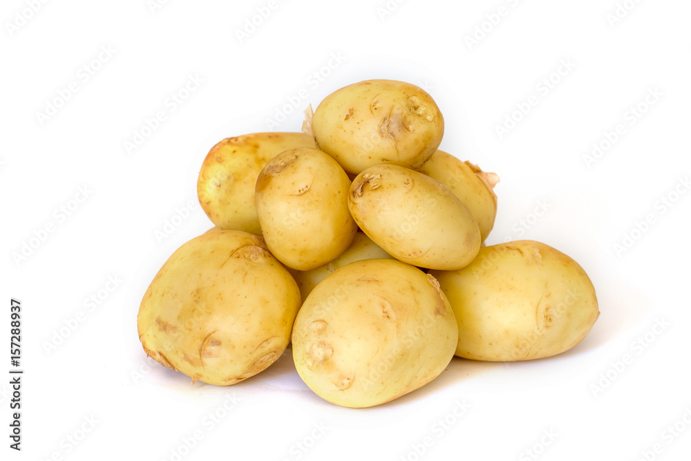 Pile of new potatoes on white background Pile of new potatoes on white background