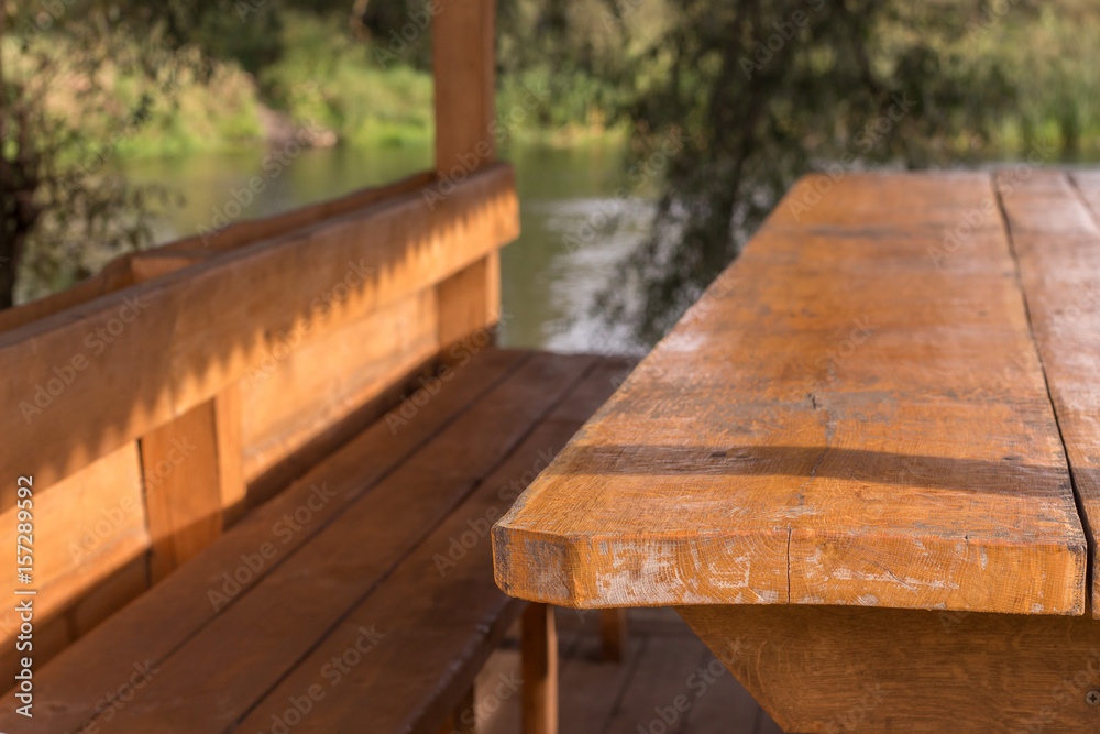 old wooden bench and table outside park fragment old wooden bench and table outside park fragment