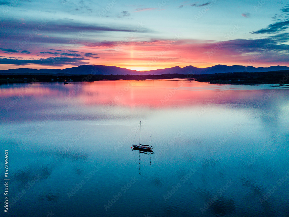 Fototapeta Aerial of an amazing sunset with sailing vessel Loch Creran, Barcaldine, Argyll #157295941