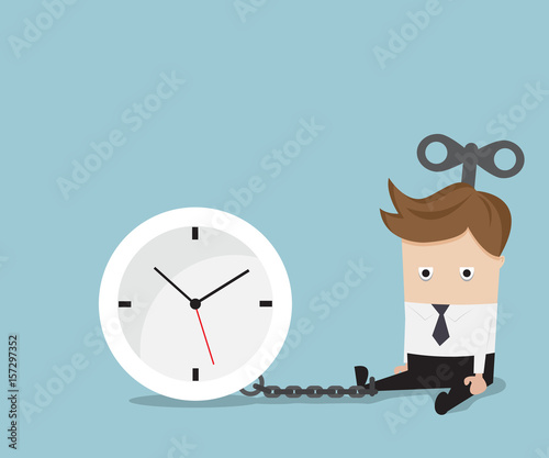 businessman gets chained with clock