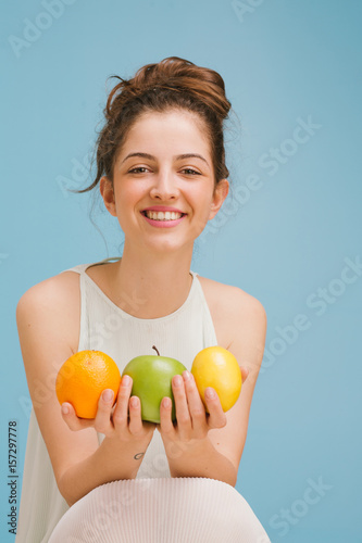 Woman with fruit  photo