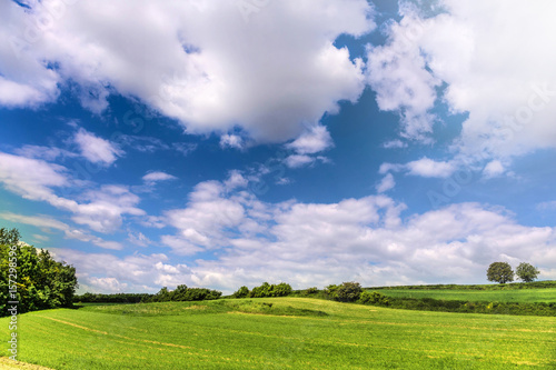Beautiful spring landscape and cloudy sky.