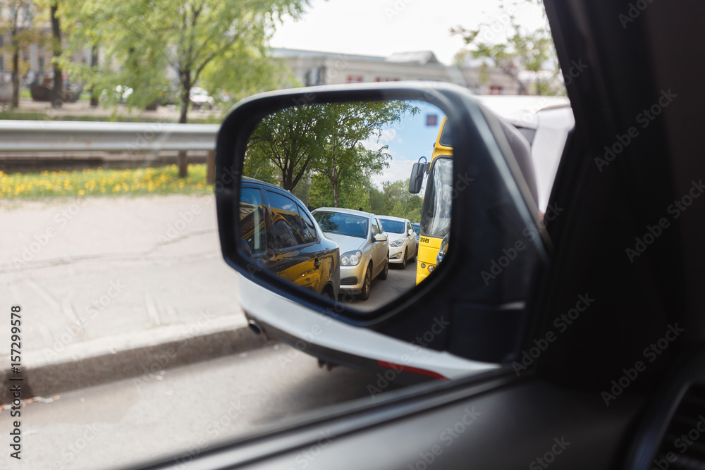 Car Mirror with Concept of traffic jam