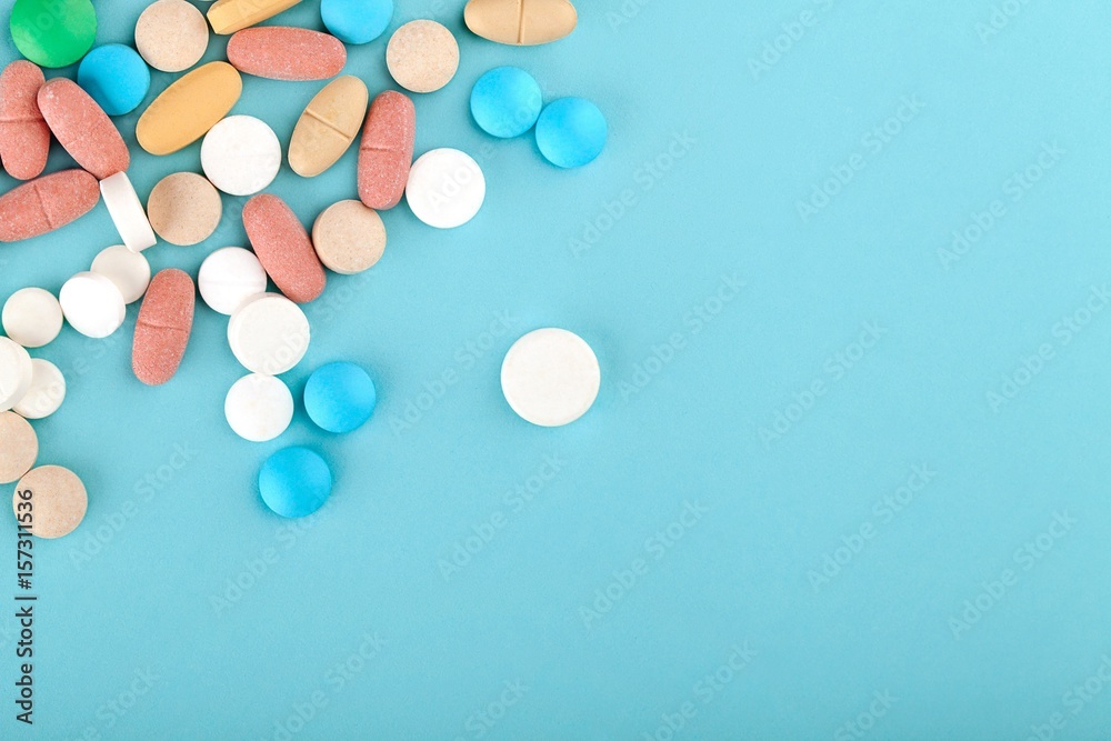 Pills on tablet.