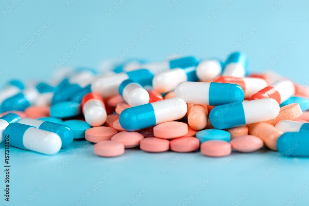 Pills on tablet.