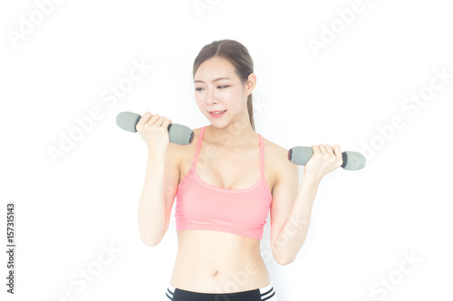 Korean woman holding dumbbell with fashion set sweet pink sexy girl, sport woman concept., isolated on white background.