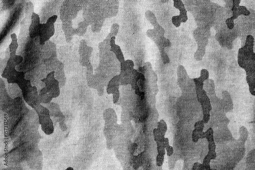 Weathered camouflage uniform pattern black and white.