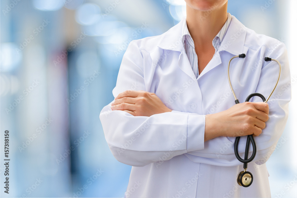 Doctor with stethoscope in hand . Doctor with stethoscope in hand .