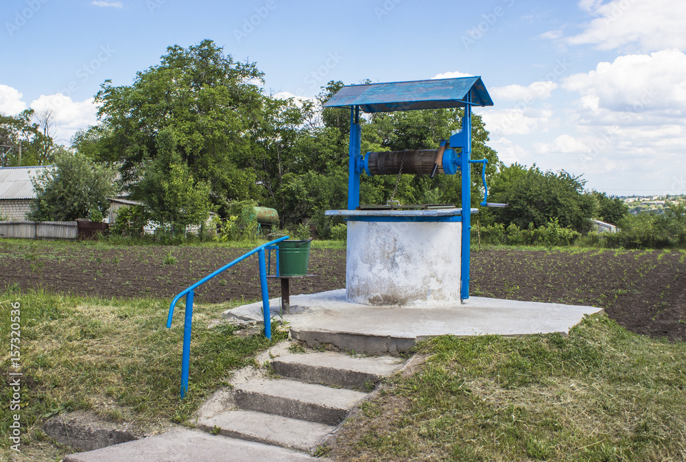 Rural well along the streets from the side Rural well along the streets from the side