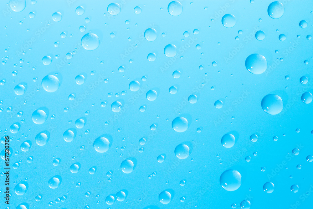 water droplets on blue glass