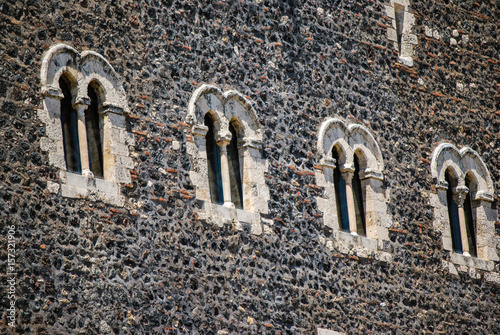 The series of Windows on the main side of the Norman castle in Paterno. Sicily
