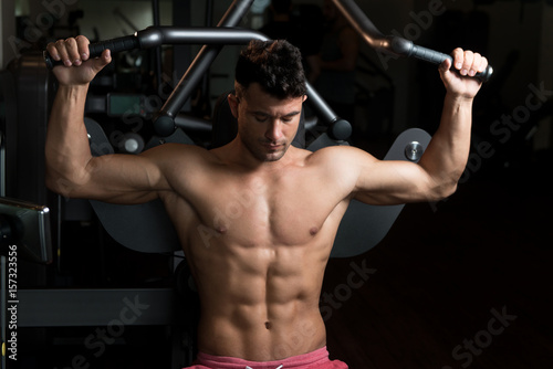 Man Doing Heavy Weight Exercise For Back