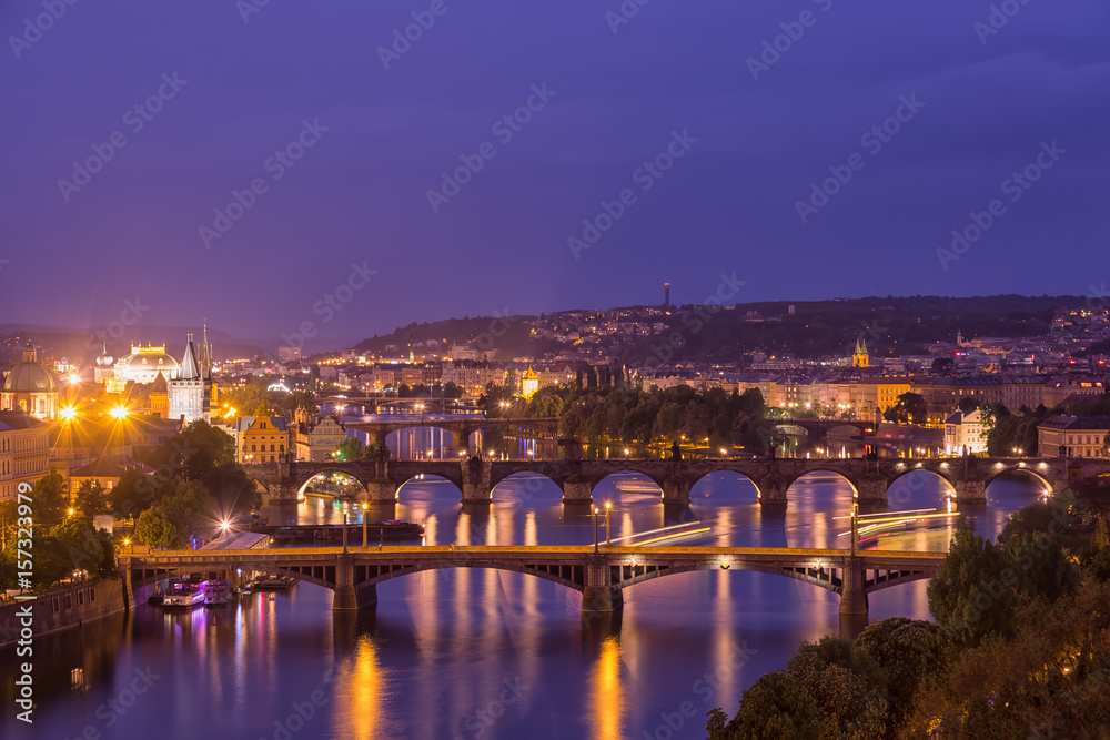 Prague at twilight blue hour, view of Bridges on Vltava
