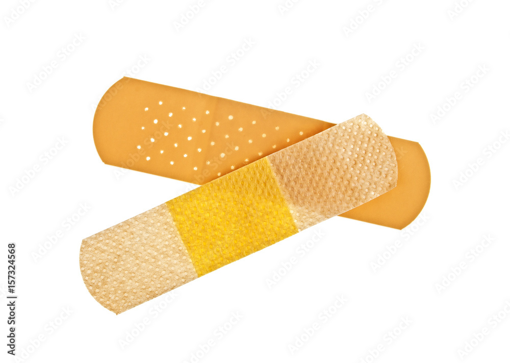 Two different sticking plasters on white background