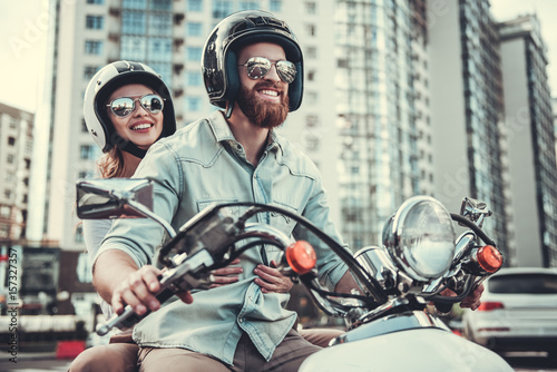 Couple on scooter photo