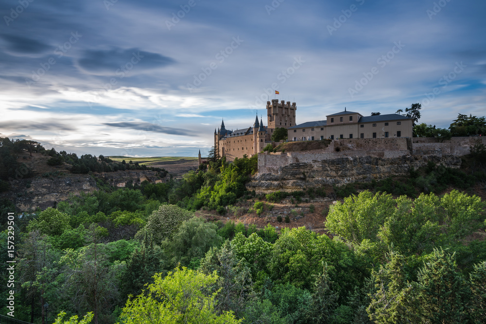 Alcazar in Segovia on hill top overlloking valley