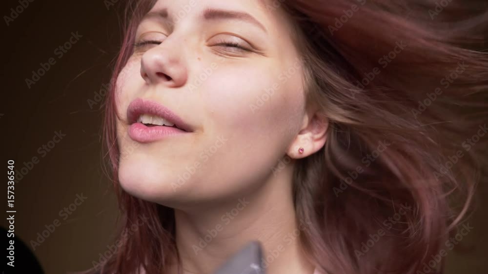 Emotional happy teenager girl make funny faces while drying her hair. Slow motion Emotional happy teenager girl make funny faces while drying her hair. Slow motion