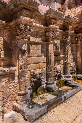 The Rimondi Fountain - 17th century Venetian water supply. Rethymno old town, Crete, Greece. photo