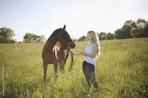 Blonde Female with a Horse in Rural Virginia © holly