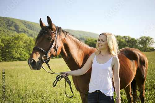 Blonde Female with a Horse in Rural Virginia