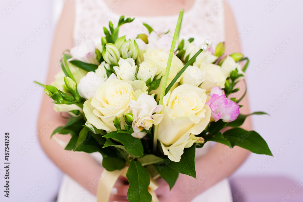 Wedding bouquet in bride's hands Wedding bouquet in bride's hands