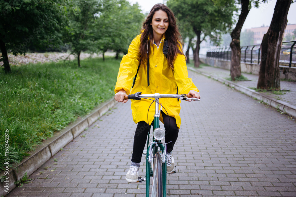 riding bicycle in rain