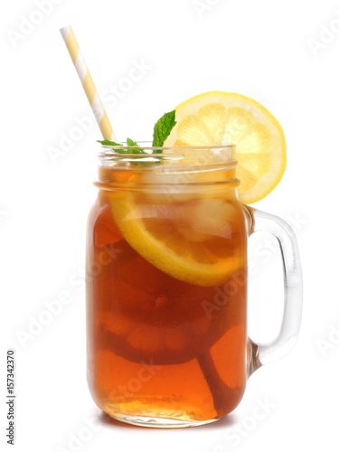 Mason jar glass of iced tea with straw isolated on a white background