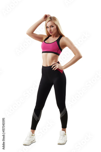 Attractive sports girl posing before fitness training