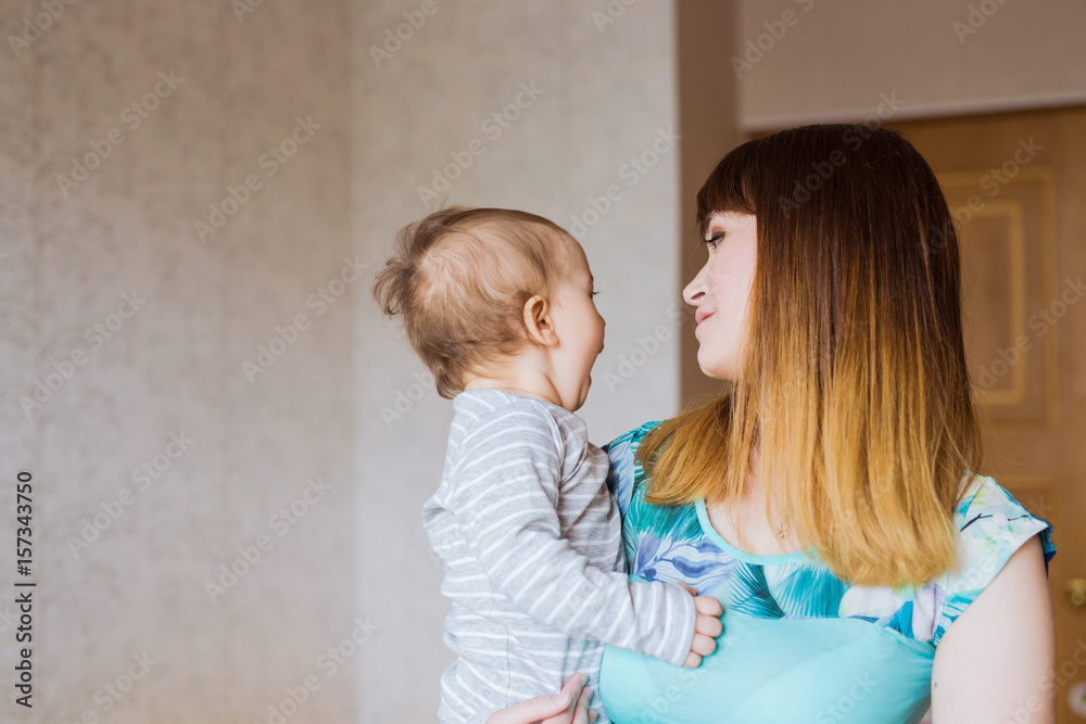 Happy mother with adorable baby boy indoors Happy mother with adorable baby boy indoors