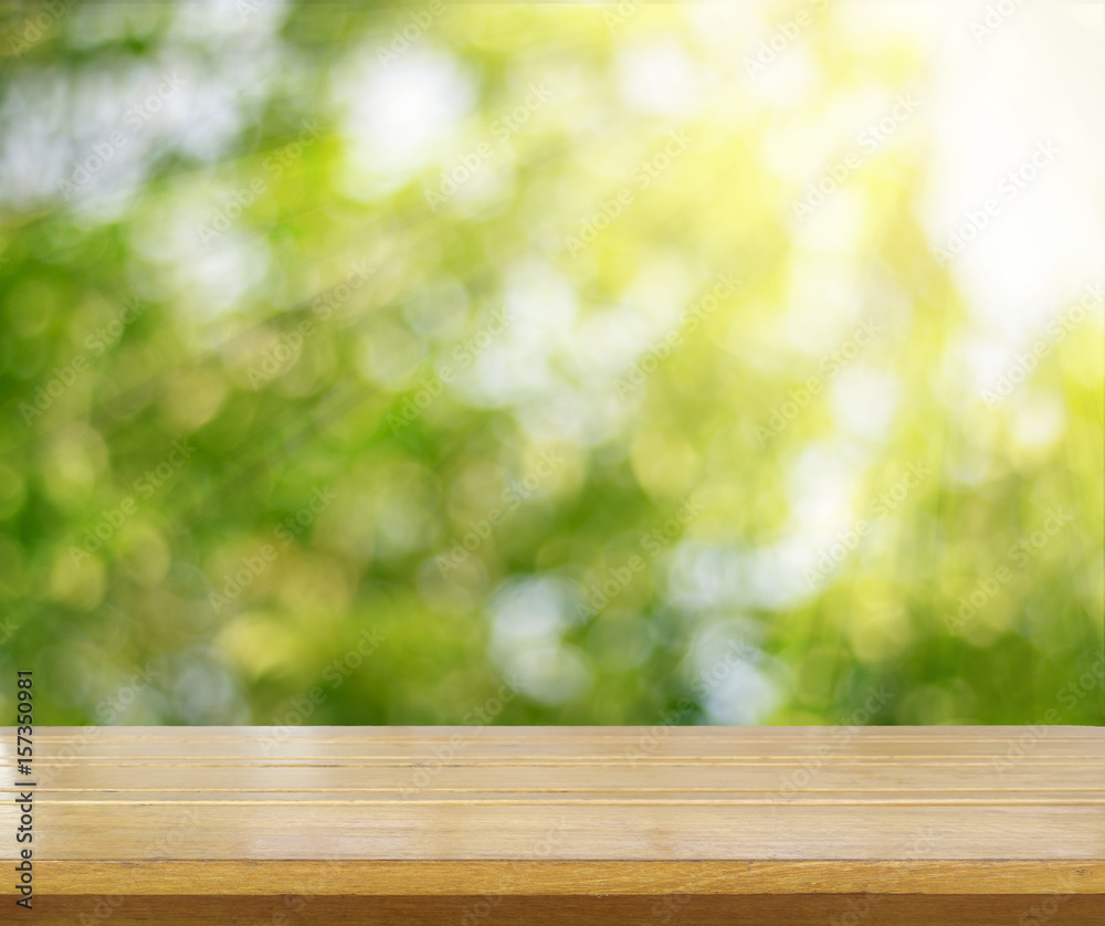 wooden tabletop surface with fresh green nature background wooden tabletop surface with fresh green nature background