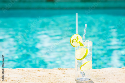 Canvas Print Water with ice at the edge of a resort pool