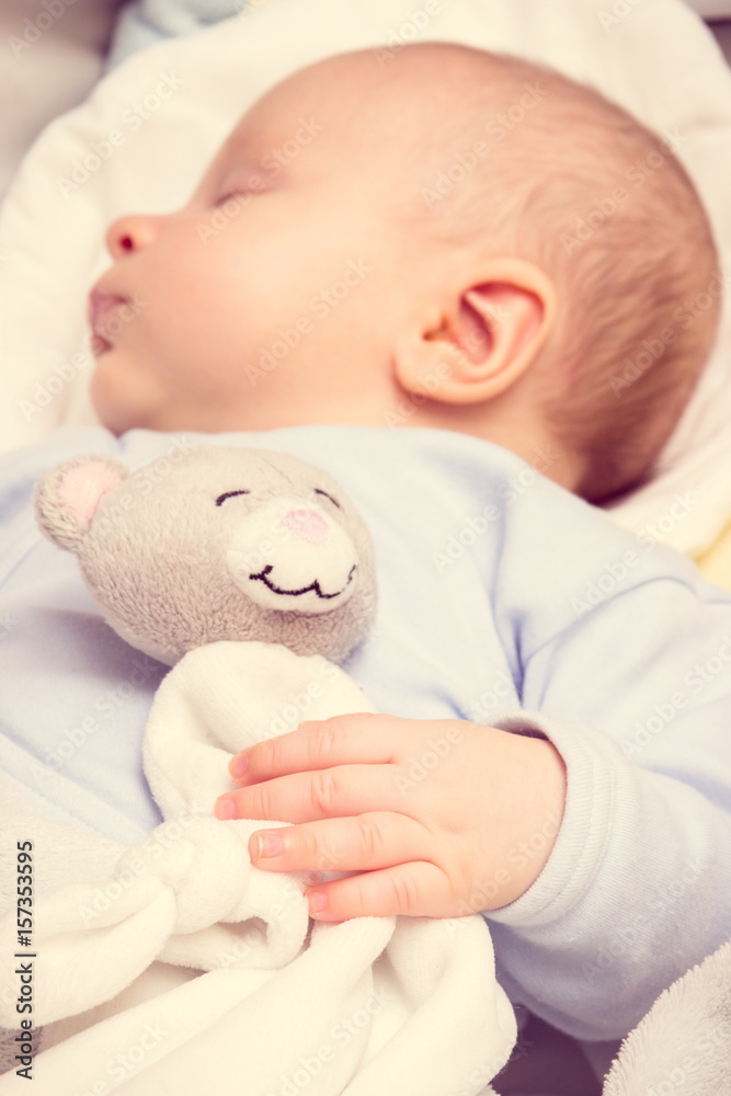 Vintage photo, Sweet newborn baby boy sleeping with toy teddy bear Stock  Photo | Adobe Stock
