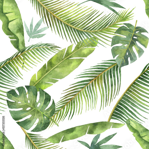 Watercolor seamless pattern with tropical leaves and branches isolated on white background. © ElenaMedvedeva
