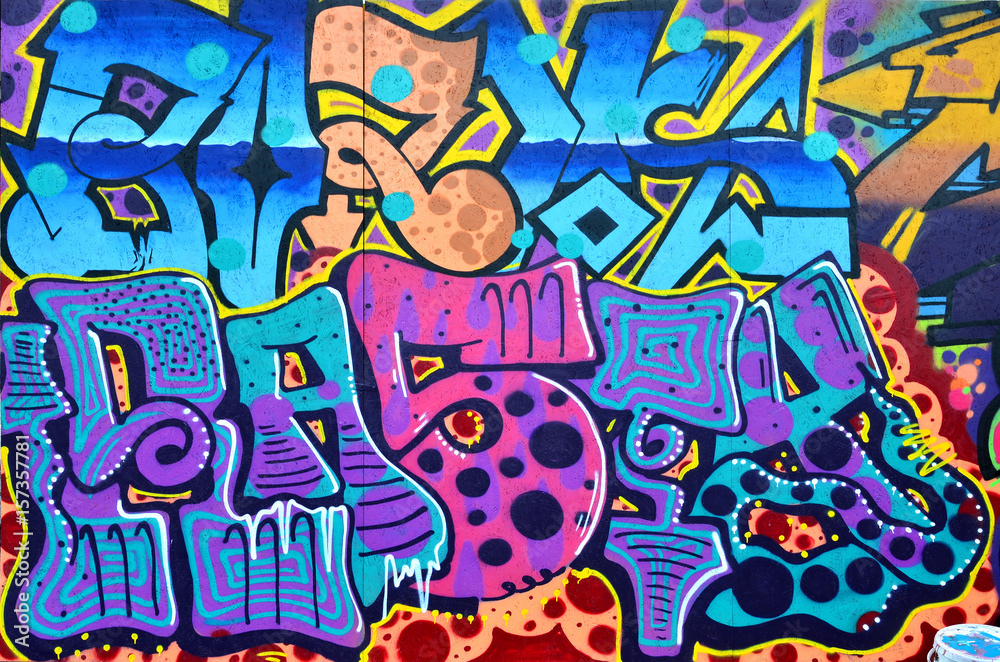 Fototapeta premium Sztuka pod ziemią. Piękny styl graffiti w stylu street art. Ściana jest ozdobiona abstrakcyjnymi rysunkami farby domowej. Nowoczesna kultowa kultura miejska młodzieży ulicznej. Streszczenie stylowy obraz na ścianie