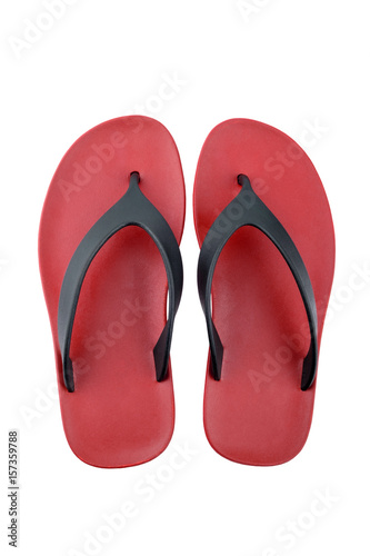 red rubber flip flops on a white background